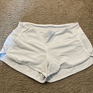White Lululemon Speed Up shorts